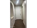 Bright entryway with tile flooring and neutral-colored walls at 16056 W Yavapai W St, Goodyear, AZ 85338