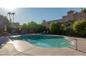 Inviting kidney shaped pool with lounge chairs at 1739 E Flynn Ln, Phoenix, AZ 85016