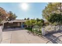 House exterior with a landscaped front yard and fence at 3601 W Solano Dr, Phoenix, AZ 85019