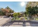 Single story home with carport and well maintained lawn at 3601 W Solano Dr, Phoenix, AZ 85019