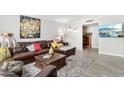Spacious living room with leather sectional sofa and wood coffee table at 4601 N 75Th St, Scottsdale, AZ 85251