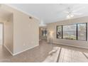 Bright living room with tile floors and fireplace at 750 E Northern Ave # 1134, Phoenix, AZ 85020