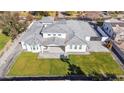 This overhead view shows the home's rear elevation, highlighting the patio and yard at 11243 E Flintlock Dr, Chandler, AZ 85249