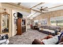 Cozy living room with wood paneling and comfy seating at 1471 E 22Nd Ave, Apache Junction, AZ 85119