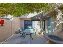 Private patio with table and chairs, perfect for outdoor dining at 16644 N 33Rd St # 105, Phoenix, AZ 85032