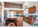 Spacious kitchen with granite countertops and stainless steel appliances at 18056 W Buena Vista Dr, Surprise, AZ 85374