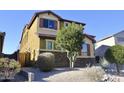 Two-story house with desert landscaping, two-car garage, and neutral color scheme at 23306 N 40Th Pl, Phoenix, AZ 85050