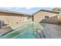 Clean lines and a spacious feel highlight this backyard pool at 2348 W Laurel Ln, Phoenix, AZ 85029