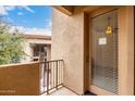 Private balcony with door access and courtyard view at 3330 S Gilbert Rd # 2001, Chandler, AZ 85286