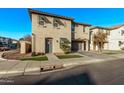 Two-story home with gray garage and front yard at 4124 E Toledo St, Gilbert, AZ 85295