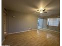 Living room with light wood flooring and ceiling fan at 4325 N 26Th St # 12, Phoenix, AZ 85016