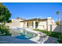 Inviting kidney-shaped pool with a large patio perfect for relaxation at 4605 E Valley View Dr, Phoenix, AZ 85044