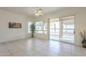 Bright dining room with tile floors and sliding glass doors at 6307 S Palo Blanco Dr, Gold Canyon, AZ 85118