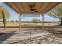 Covered patio overlooking a golf course at 6307 S Palo Blanco Dr, Gold Canyon, AZ 85118