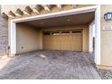 Attached two-car garage with paver driveway at 653 N Abalone Dr, Gilbert, AZ 85233