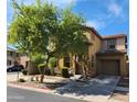 Two story house with attached garage and front yard at 7844 W Bonitos Dr, Phoenix, AZ 85035