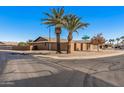 View of home's exterior, showing the side and a corner of the house at 9714 W Rodeo Ct, Sun City, AZ 85373