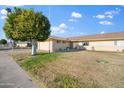 Single story home exterior with a nicely landscaped yard at 9802 N Balboa Dr, Sun City, AZ 85351