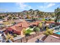 House with expansive backyard, pool, and distant mountain views at 215 E Marconi Ave, Phoenix, AZ 85022