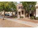 Two-story house with a covered porch and landscaping at 4044 E Oakland St, Gilbert, AZ 85295