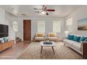 Bright living room featuring comfy seating and a stylish coffee table at 4044 E Oakland St, Gilbert, AZ 85295