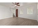 Spacious living room with hardwood floors and ceiling fan at 4044 E Oakland St, Gilbert, AZ 85295