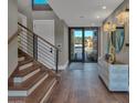 Bright and spacious entryway with hardwood floors and modern console table at 6525 E Cave Creek Rd # 14, Cave Creek, AZ 85331