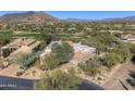 Luxury home with mountain views and a golf course nearby at 7546 E High Point Dr, Scottsdale, AZ 85266