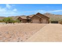 One-story home with three-car garage and paver driveway at 8474 W Switchback Trl, Casa Grande, AZ 85194