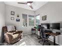 Home office featuring a comfortable chair, workspace, and natural light at 1110 S Jay St, Chandler, AZ 85286