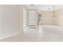 Bright and airy living area showcasing tile floors and neutral color palette at 1242 E Bartlett Way, Chandler, AZ 85249