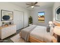 Cozy bedroom with ample closet space and large window at 130 N 95Th Pl, Mesa, AZ 85207