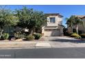 Two-story house with landscaped yard and two-car garage at 18546 E Oak Hill Ln, Queen Creek, AZ 85142