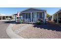 Charming house with walkway, and American flag at 2206 S Ellsworth Rd # 72B, Mesa, AZ 85209