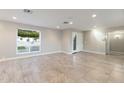 Bright and airy living room with tile floors and large window at 5429 E Bloomfield Rd, Scottsdale, AZ 85254