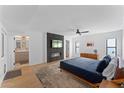 Bright main bedroom with ensuite bathroom and modern fireplace at 5717 E Justine Rd, Scottsdale, AZ 85254