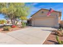 House exterior showcasing a garage and neatly landscaped yard at 6825 S Whetstone Pl, Chandler, AZ 85249