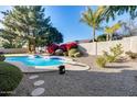 Relaxing pool area with diving board and landscaping at 7132 W Villa Chula --, Glendale, AZ 85310