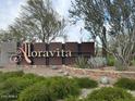 Community entrance sign with landscaping at 7689 W Smoketree Dr, Peoria, AZ 85383