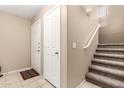 An entryway with stairs, tile floor, and a coat closet at 900 S 94Th St # 1001, Chandler, AZ 85224