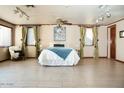 Bright bedroom with tiled floors and neutral decor at 2157 W Mulberry Dr, Phoenix, AZ 85015