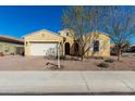 Beautiful Craftsman home with a two car garage and well-manicured landscaping at 3082 E Jade Ct, Chandler, AZ 85286