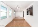 Spacious dining area with hardwood floors and lots of natural light at 747 E Germann Rd # 67, San Tan Valley, AZ 85140