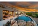 Stunning pool with a large patio, perfect for entertaining at 11453 E Mark Ln, Scottsdale, AZ 85262