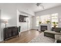 Living room with sectional sofa and fireplace at 16 W Encanto Blvd # 409, Phoenix, AZ 85003