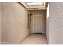 Front entry with security door and tile flooring at 1803 N Desert Willow St, Casa Grande, AZ 85122