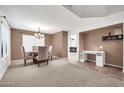 Dining room with table, chairs, and built-in desk at 20219 N 33Rd Pl, Phoenix, AZ 85050