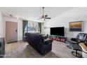 Living room featuring a large TV and comfortable seating at 2722 Leisure World --, Mesa, AZ 85206