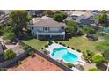 Aerial view showing home, pool, and large backyard at 3606 W Le Marche Ave, Phoenix, AZ 85053