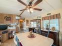 Bright dining area with table, chairs, and built-in hutch at 7750 E Broadway Rd # 123, Mesa, AZ 85208